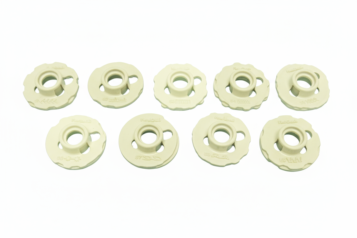 White sewing machine bobbins with white background